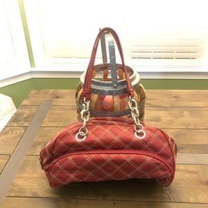 Red Purse With Chain Detail On Handles